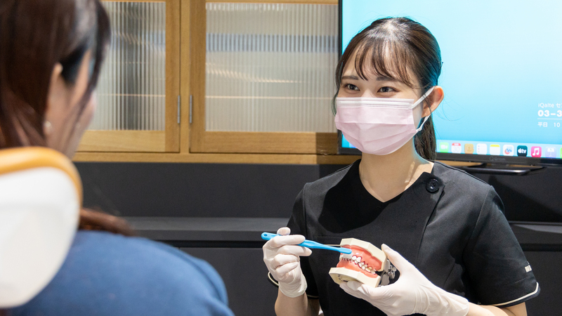 Tooth Brushing Instruction-beautiful dental hygienist